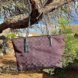 Black COACH signature C style handbag